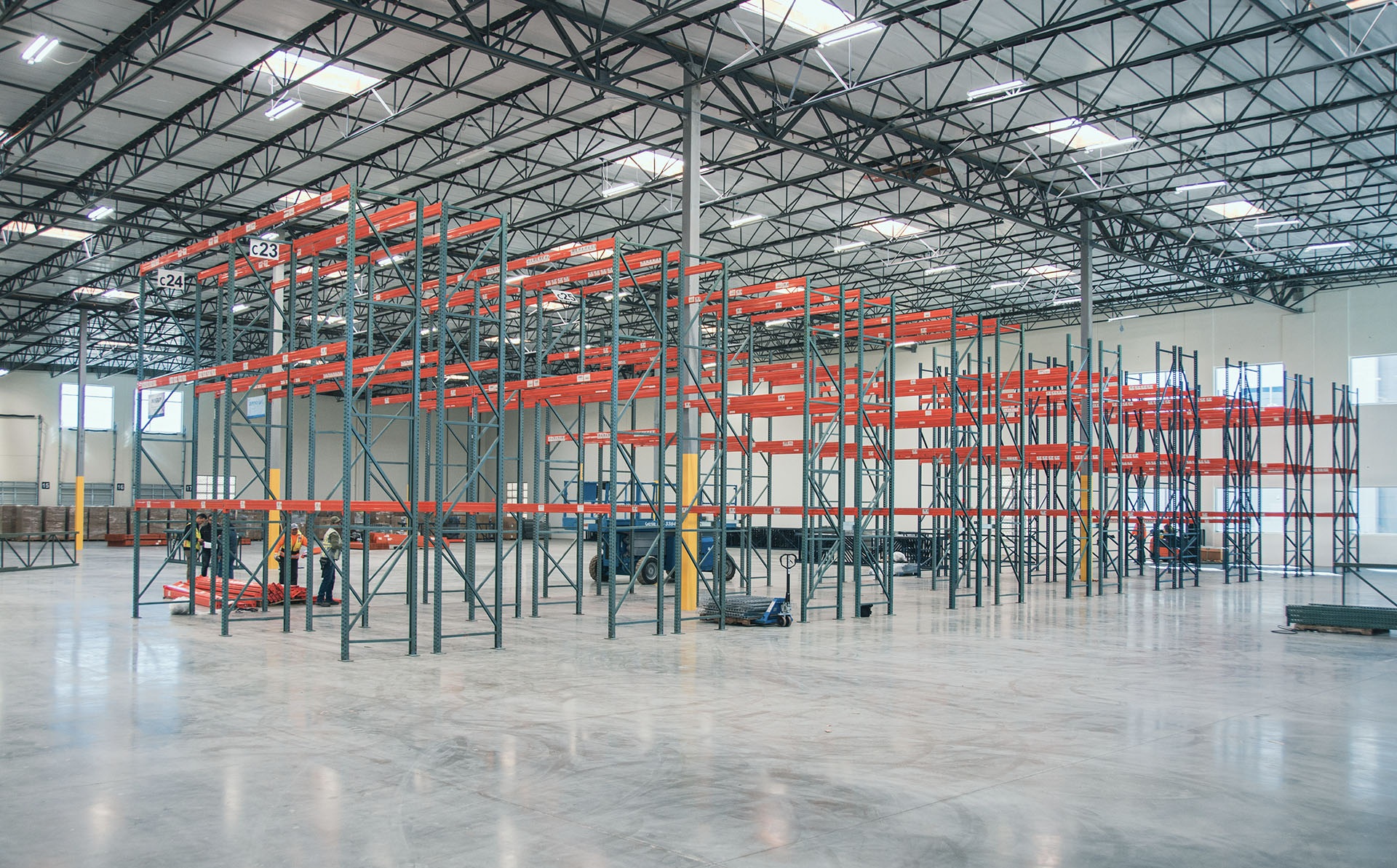 Selective pallet rack bays loaded with pallets